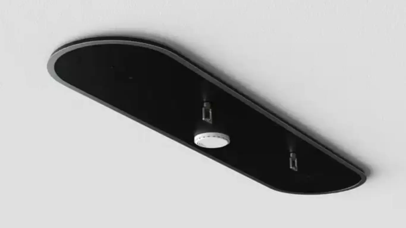 Untitled design (31)_68776128bf078 Ceiling-mounted modern fire suppression system with dual nozzles and a central detector on a sleek black panel.